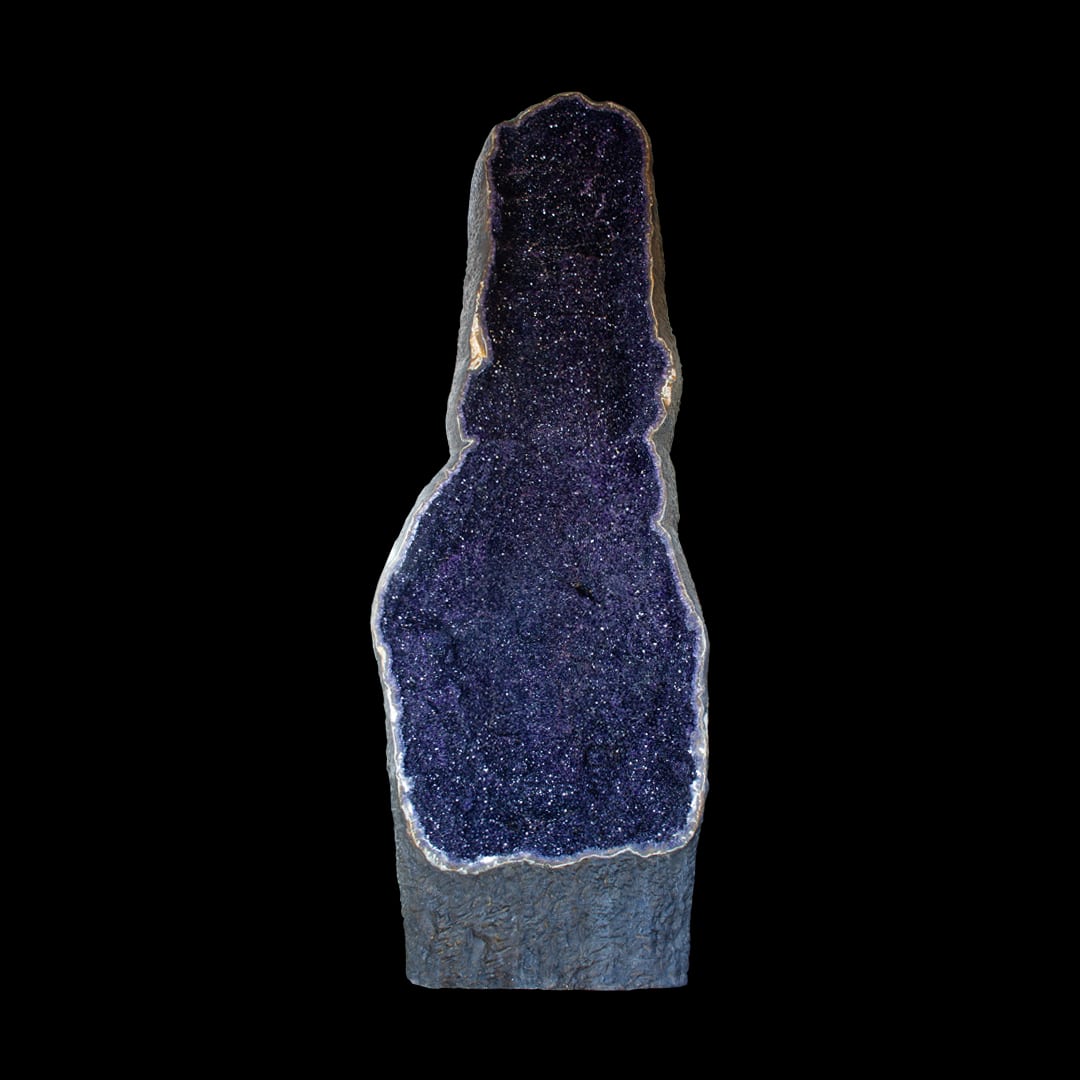 A giant open amethyst geode, standing upright