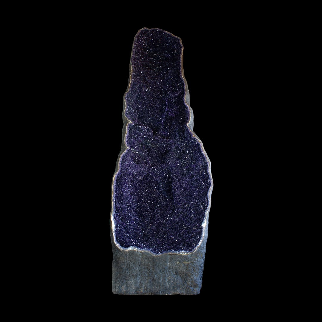 A giant open amethyst geode, standing upright