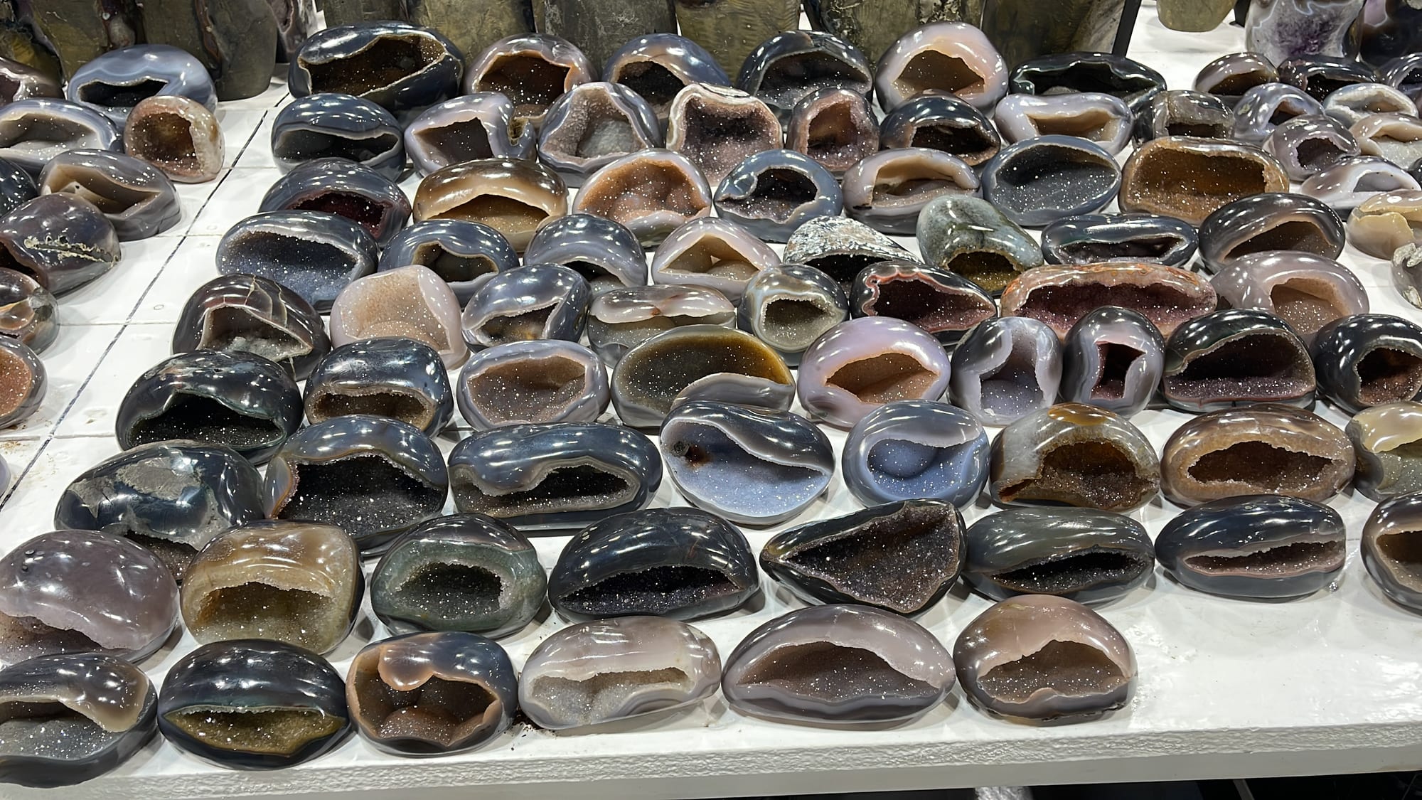 Small open agate geodes with quartz interiors, on a table