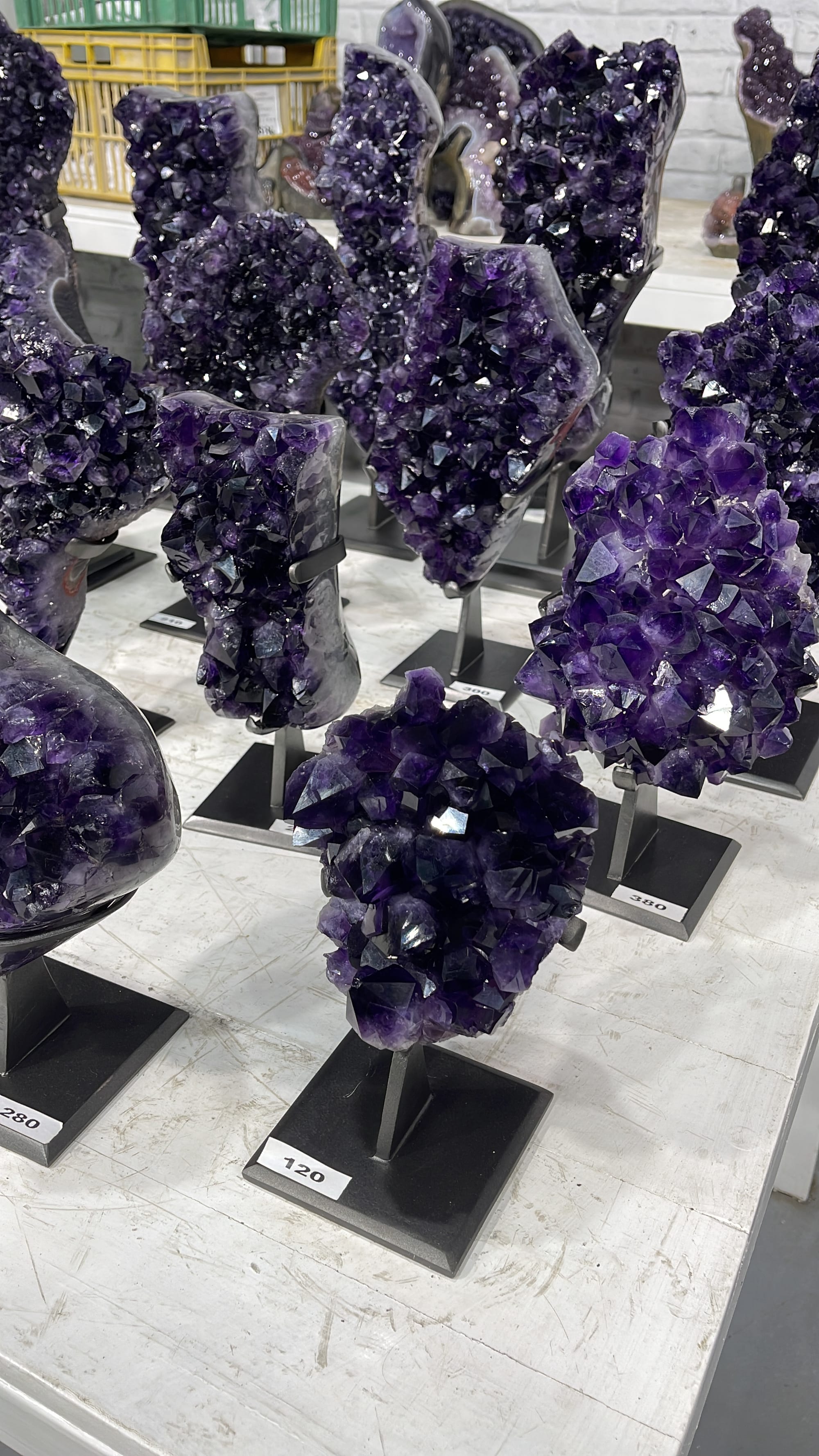 Amethyst pieces on display stands
